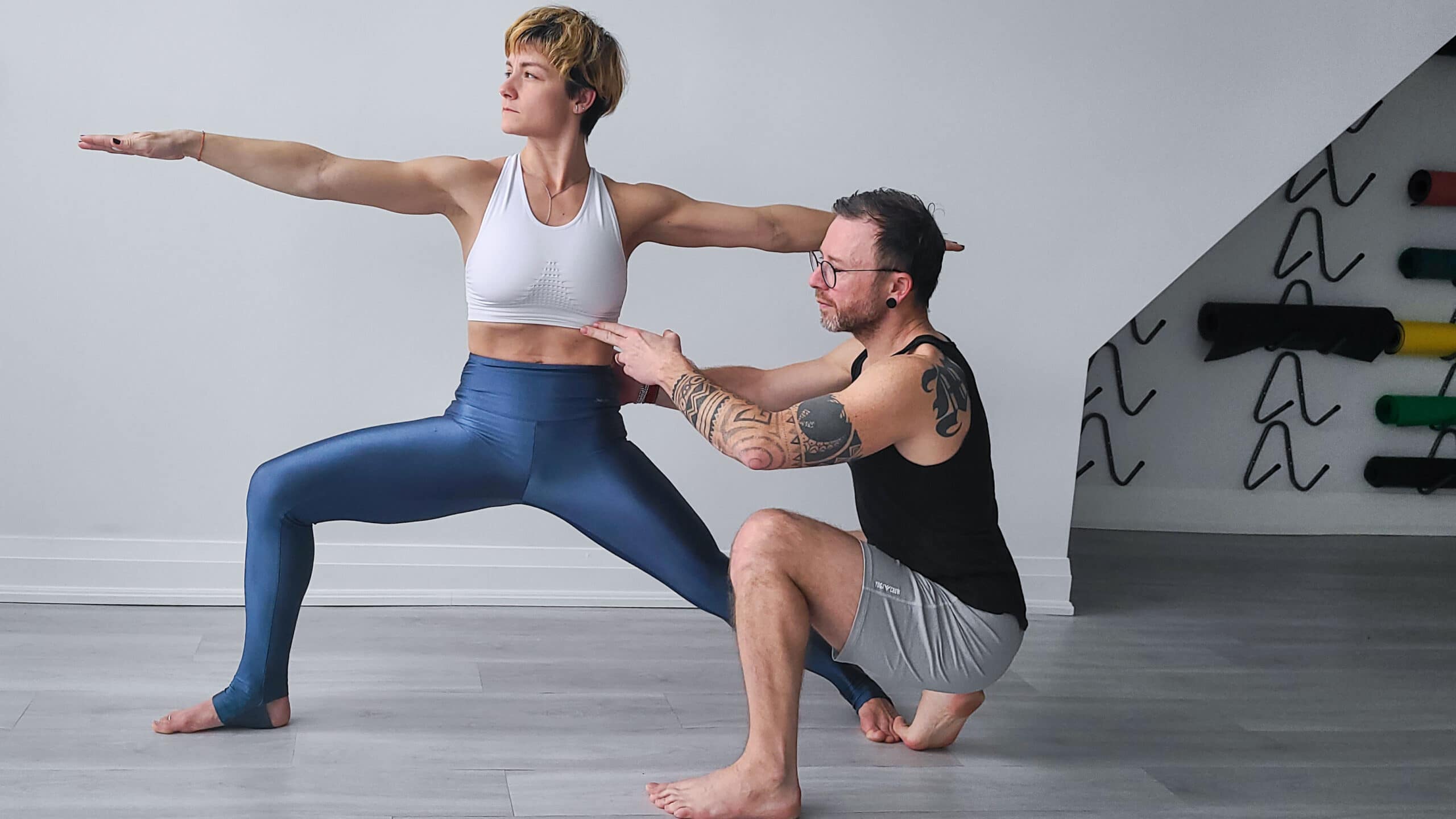 David assisting Jelena in utthita parsvakonasana