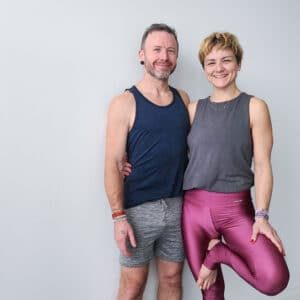 David and Jelena Standing In The Yoga Studio